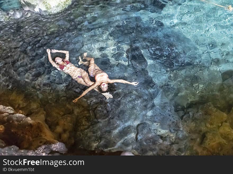 Hispanic Brunette Model Enjoying A Swim In A Cenote