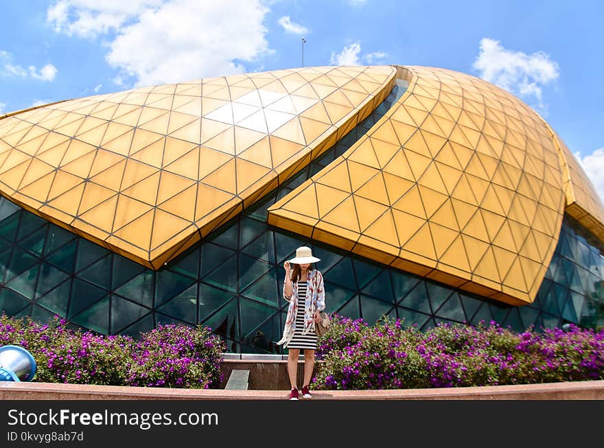 Woman Standing Near Dome Building