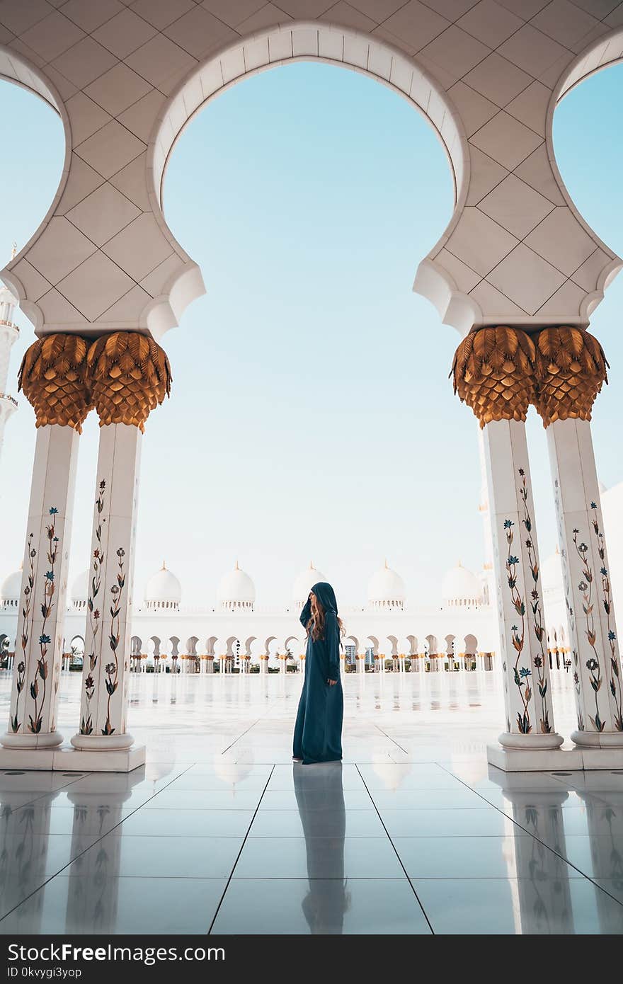 Photo of Woman Wearing Blue Coat