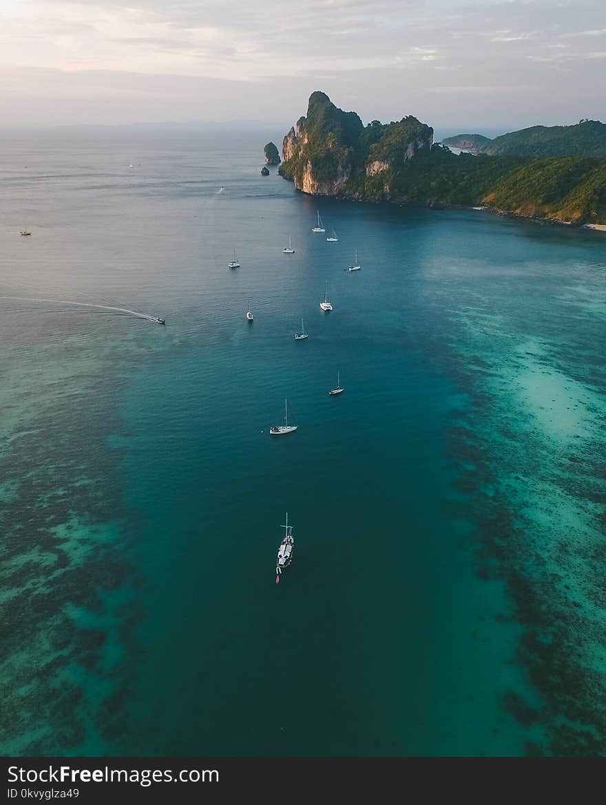 Body of Water and Green Mountains