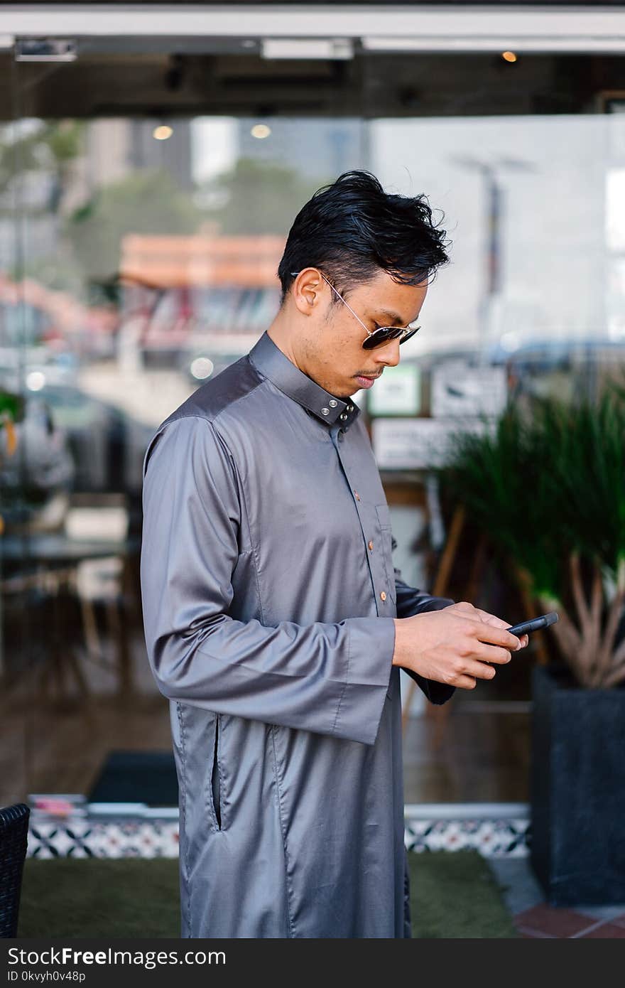 Man Wearing Gray Dress Shirt