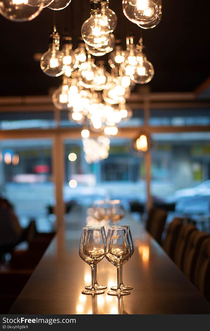 Selective Focus Photography of Wine Glasses