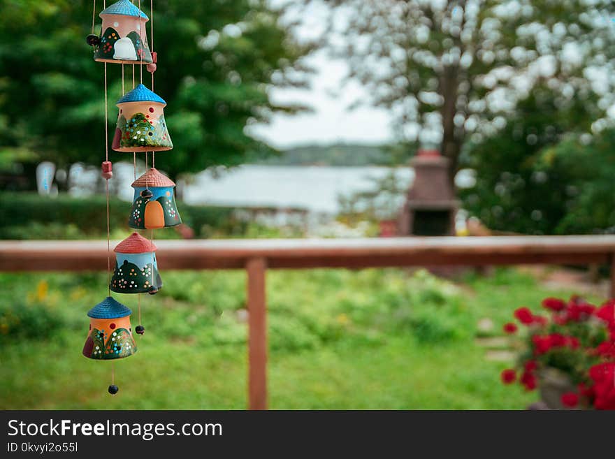 Shallow Focus Photography of Windchimes