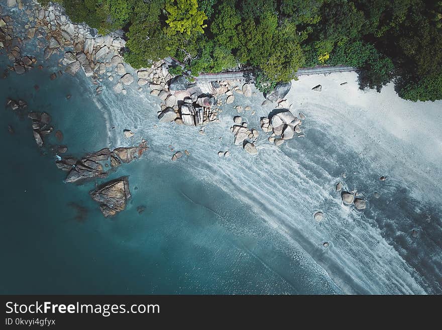 Aerial Photography of Stones on Seashore