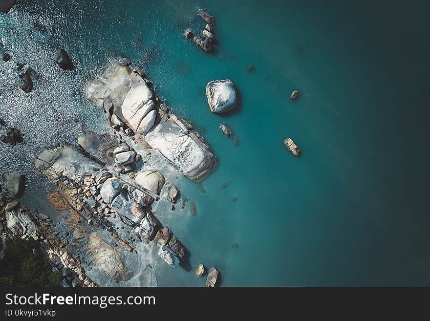 Body of Water With Rocks