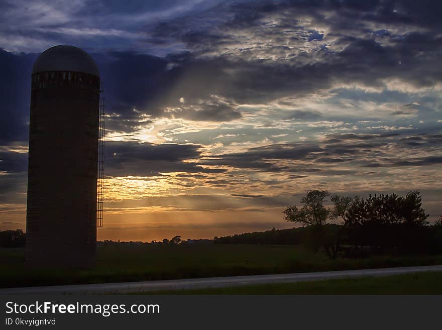 Silhouette of Silo during Sundown