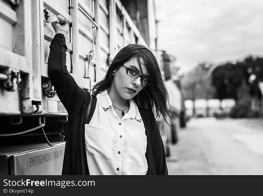 Woman With Zip-up Jacket Stand Beside Truck