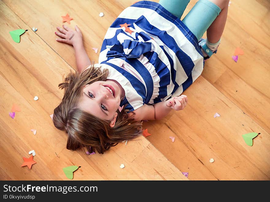 Girl Wearing White and Black Stripe Dress