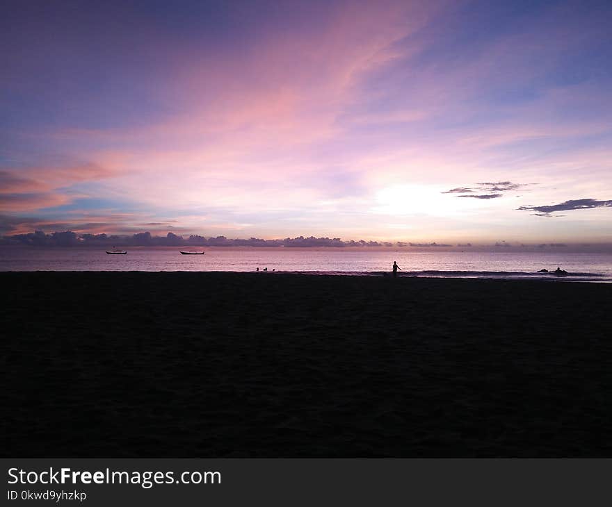 Silhouette Photography of People on Seashore