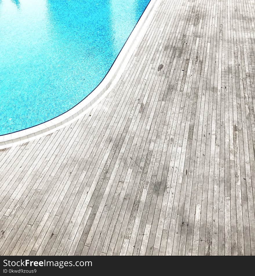 Wooden Floor Beside Pool