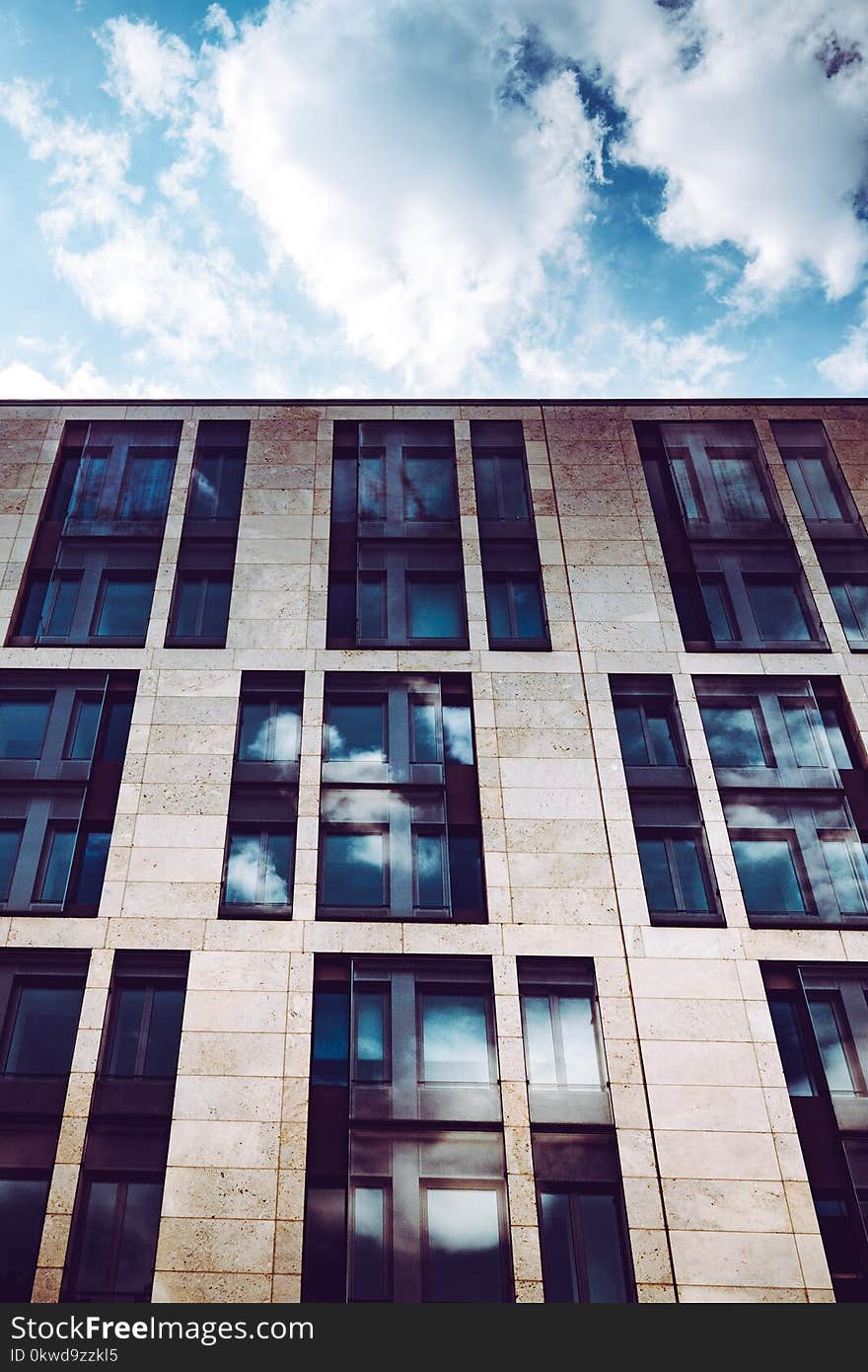 Building Under Blue Sky and White Clouds