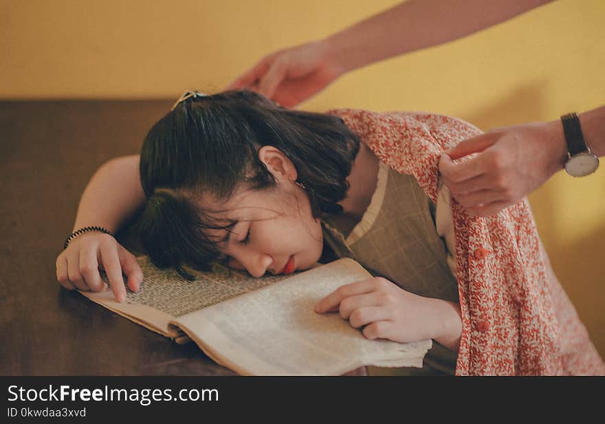 Person Covering Woman With Blanket