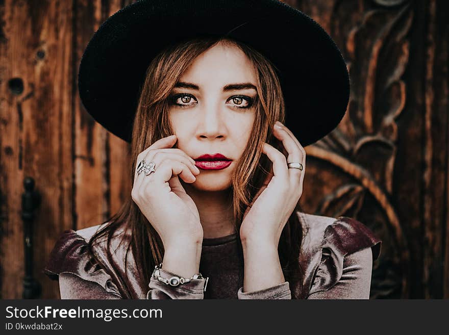 Woman Wearing Black Hat