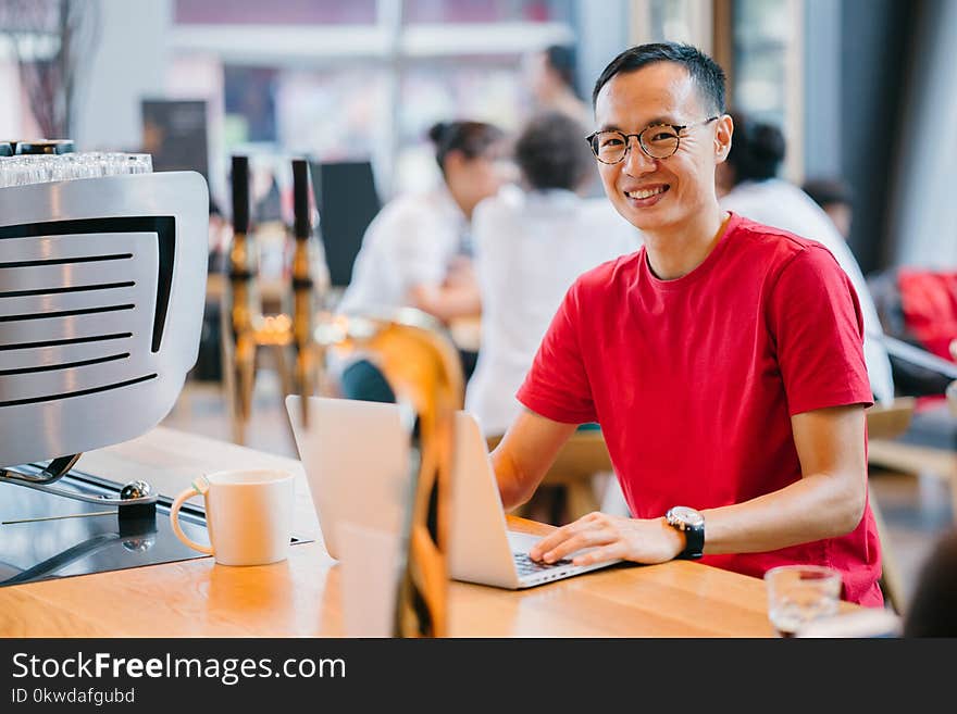 Man Wearing Red Crew-neck Shirt