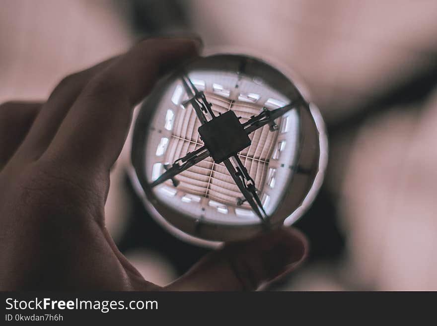 Selective Focus Photography of Person Holding Water Bubble