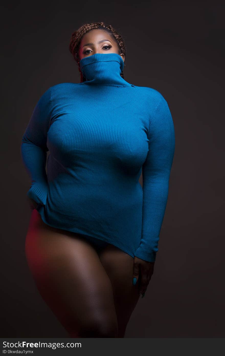 Woman in Blue Turtleneck Sweatshirt