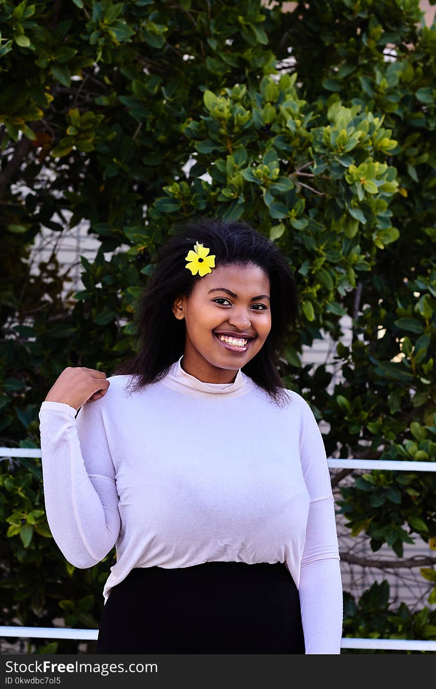 Smiling Woman Wearing White Long-sleeved Blouse