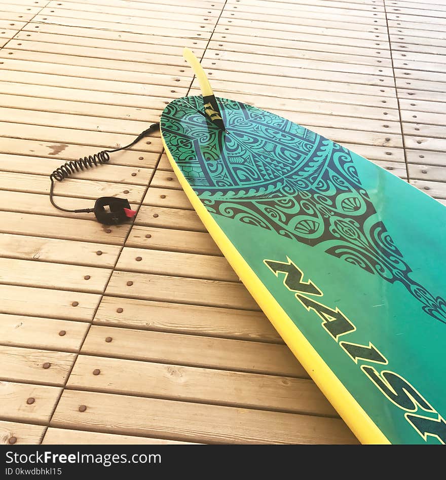 Green and Yellow Surfboard