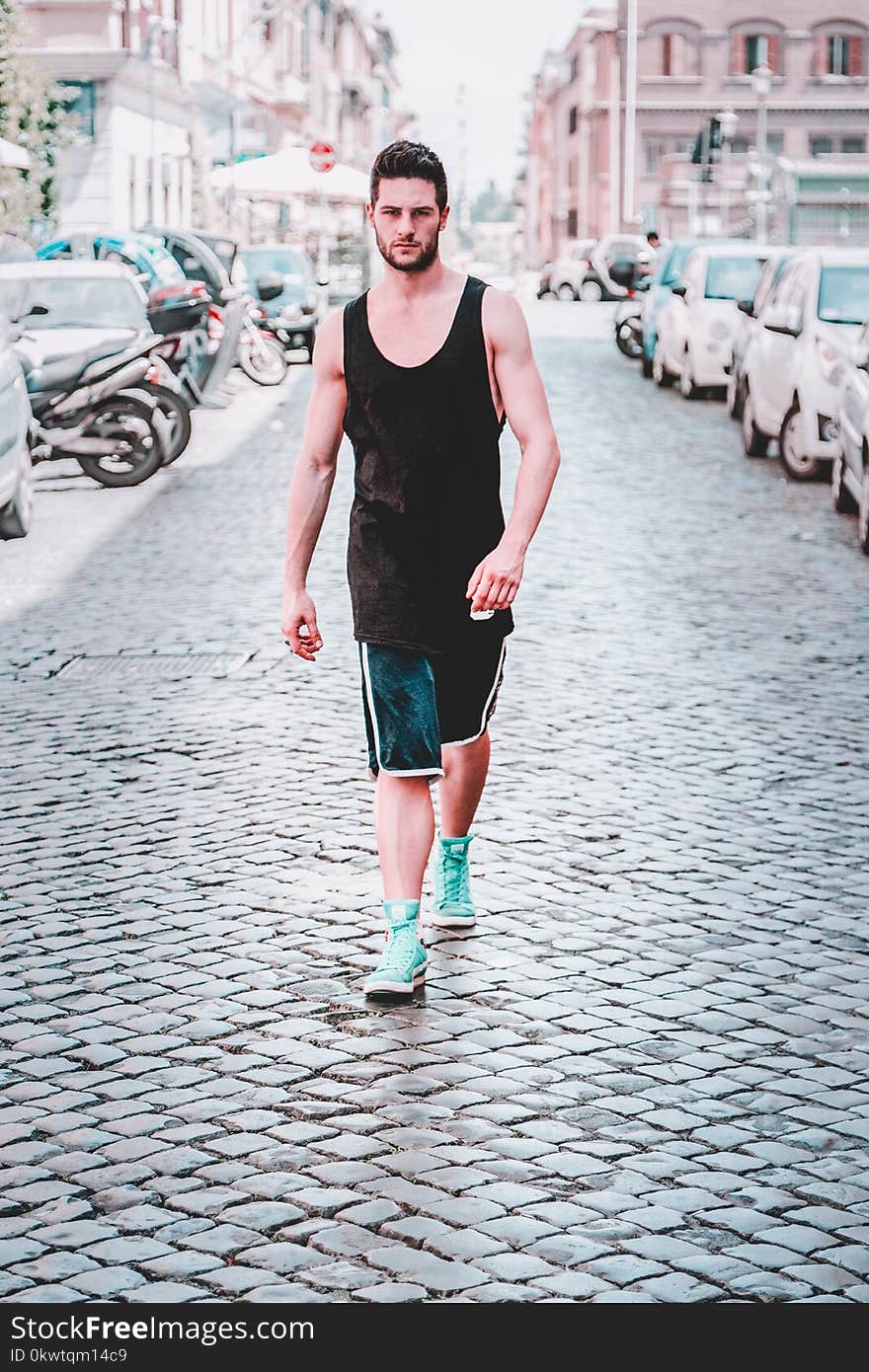 Man In Black Tank Top