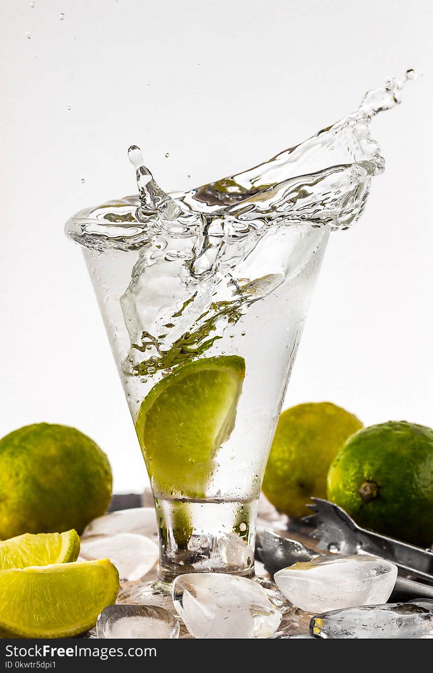 Water Filled Glass Cup With Sliced Lime