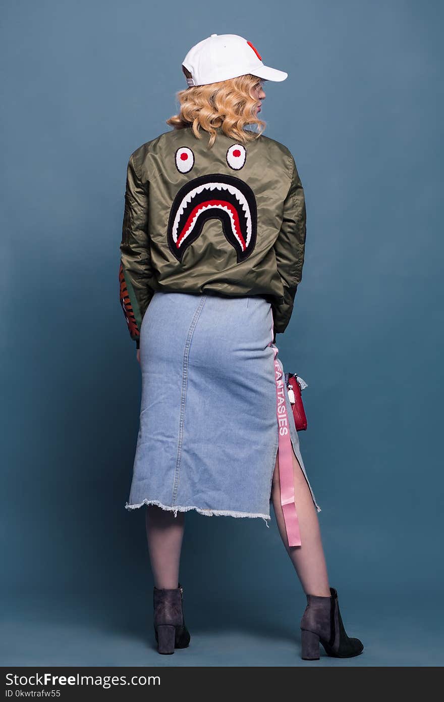 Woman Wearing Green Bathing Ape Jacket and Bottom Skirt