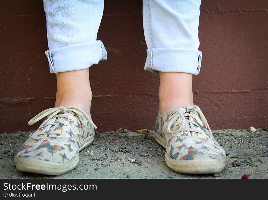 Person Wearing Brown Low-top Sneakers