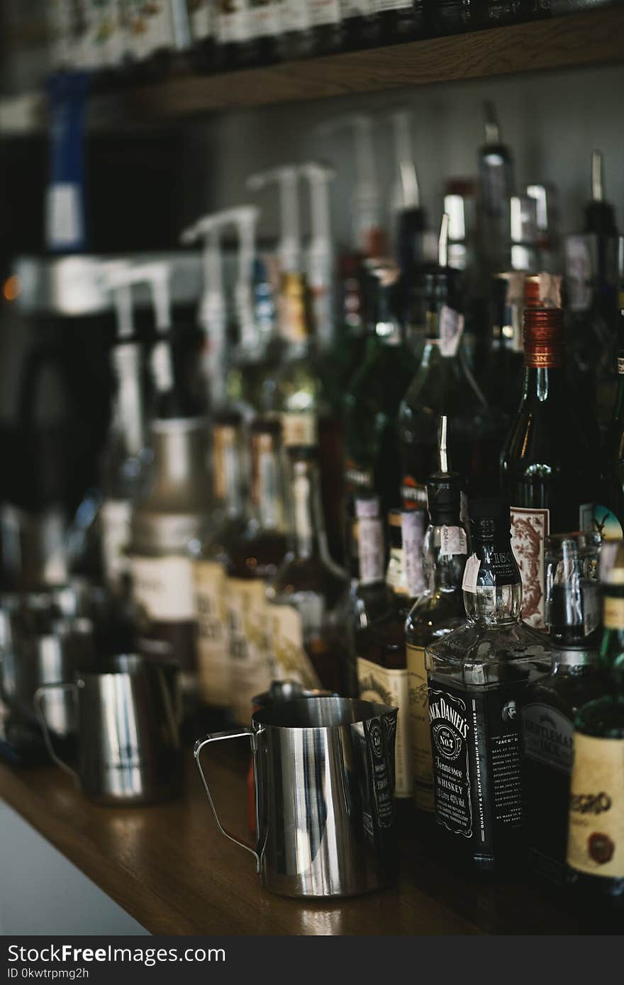 Selective Focus Photography of Assorted-brand Liquor Bottles