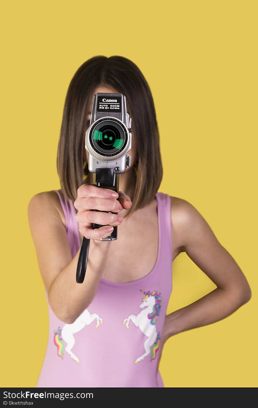 Girl Wearing Purple Tank Top Holding Canon Camera