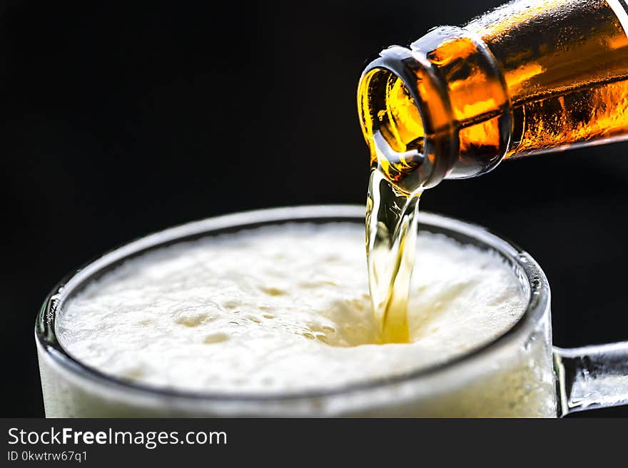 Clear Glass Beer Mug Filled With Beer