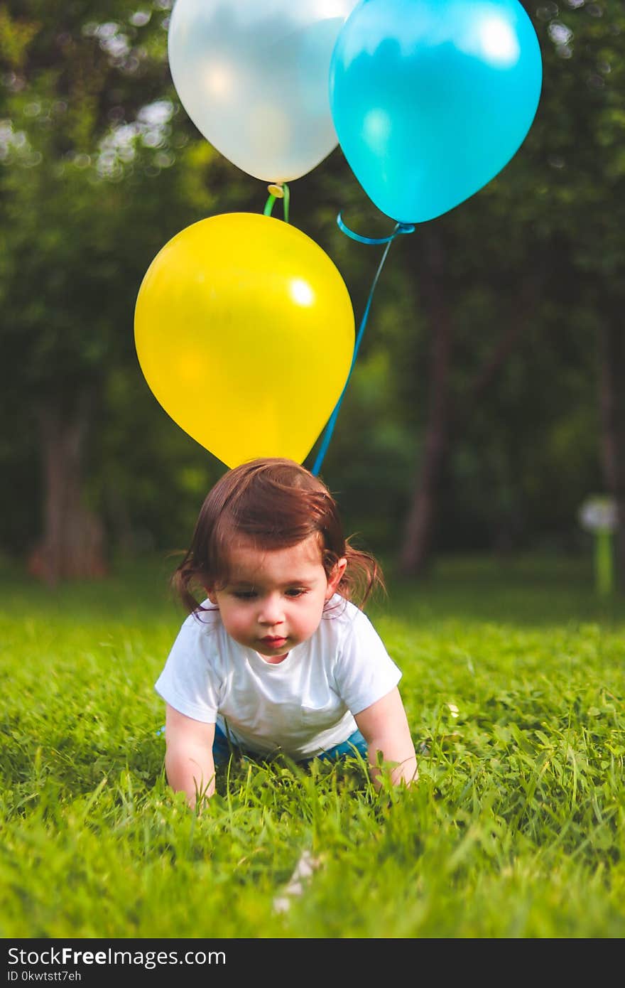 Photography of a Baby On Grass