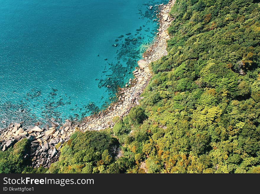 Island Surrounded With Body of Water