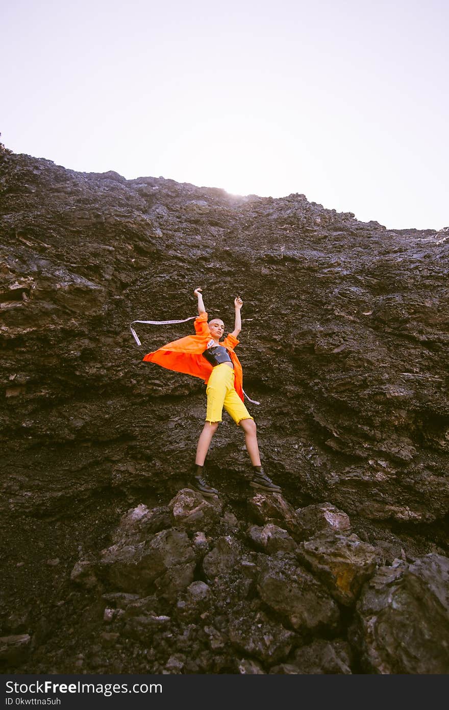 Person Wearing Orange Jacket