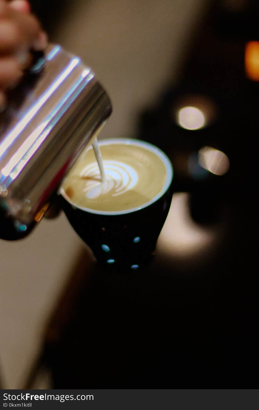 Close-up Photography of Latte Art Making