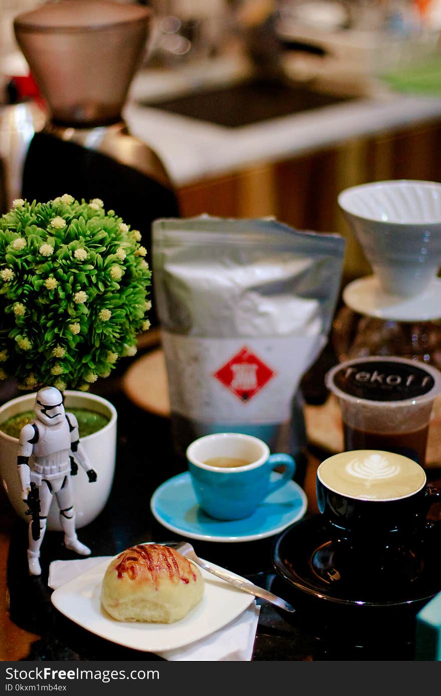 Shallow Focus Photography of Bread and Coffee