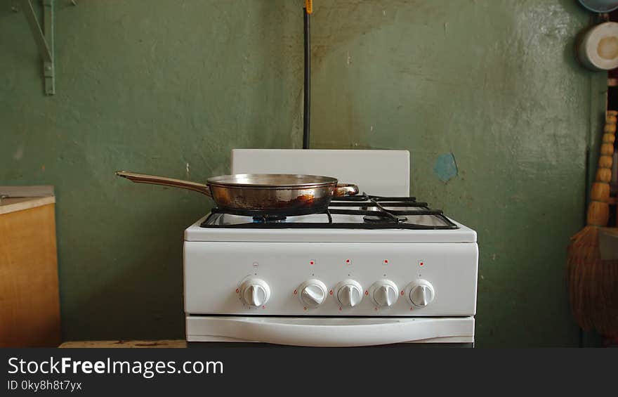 Steel Pan On A Gas Stove In An Old Kitchen Of A Communal Flat