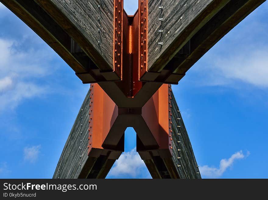 Orange and Brown X-form Architectural Building