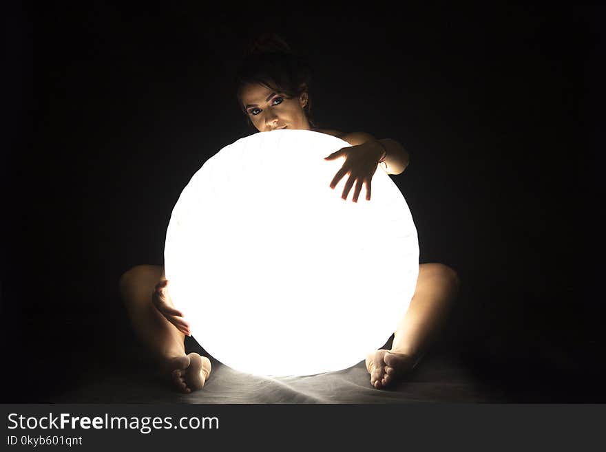 Woman Holds Led Large Ball