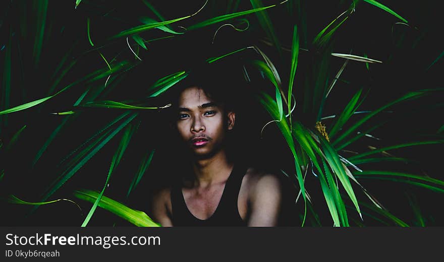 Man Wearing Black Tank Top