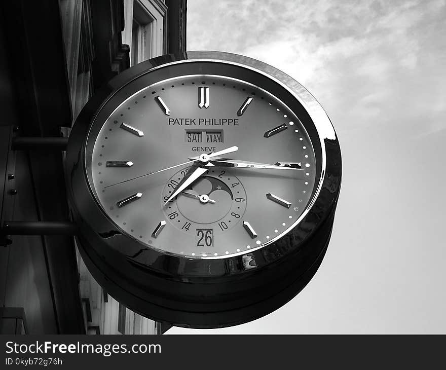 Gray Patek Philippe Clock Displaying 7:16