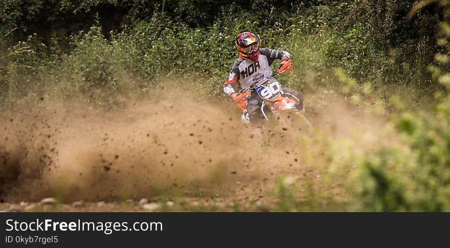 Person Riding Motocross Dirt Bike