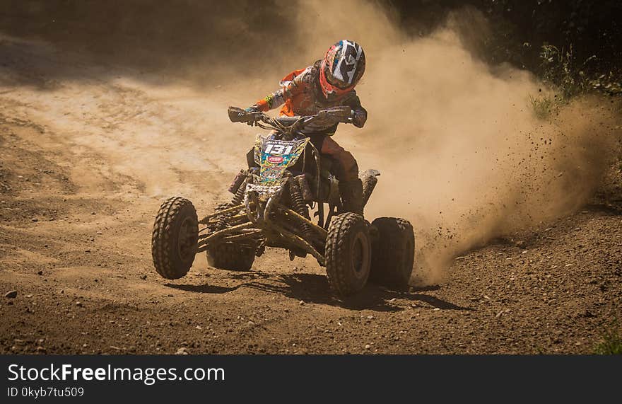 Person Riding on Black Atv Quad Bike