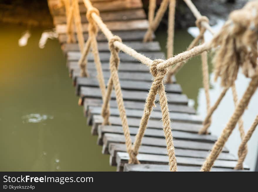 A large rope that tied the knot made a bridge for people to cross. And for adventure. A large rope that tied the knot made a bridge for people to cross. And for adventure