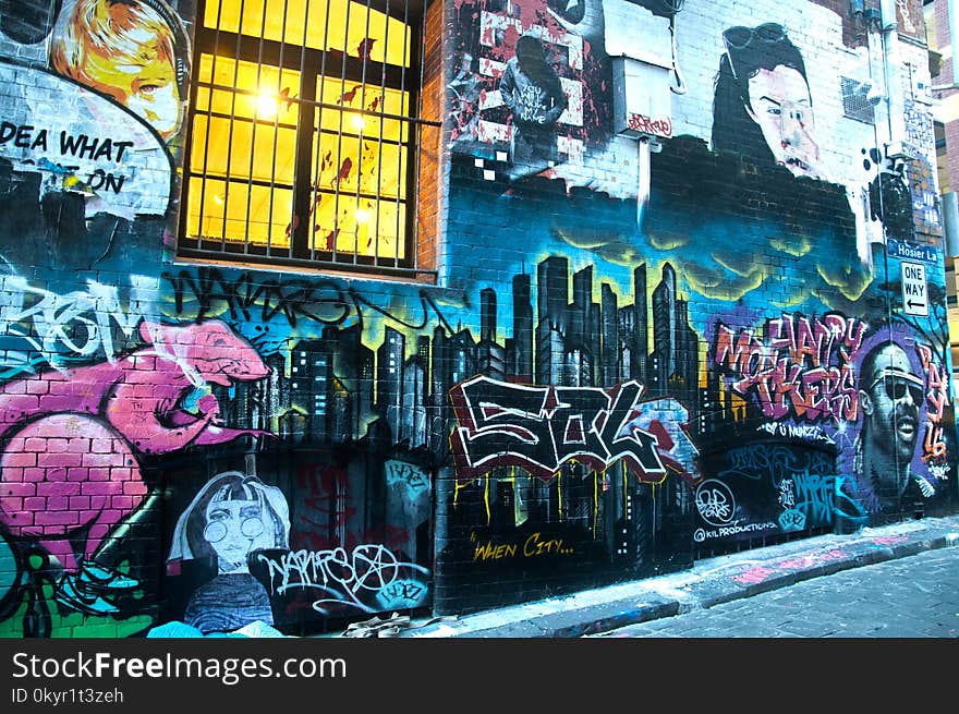 Photography of Graffiti on Brickwall