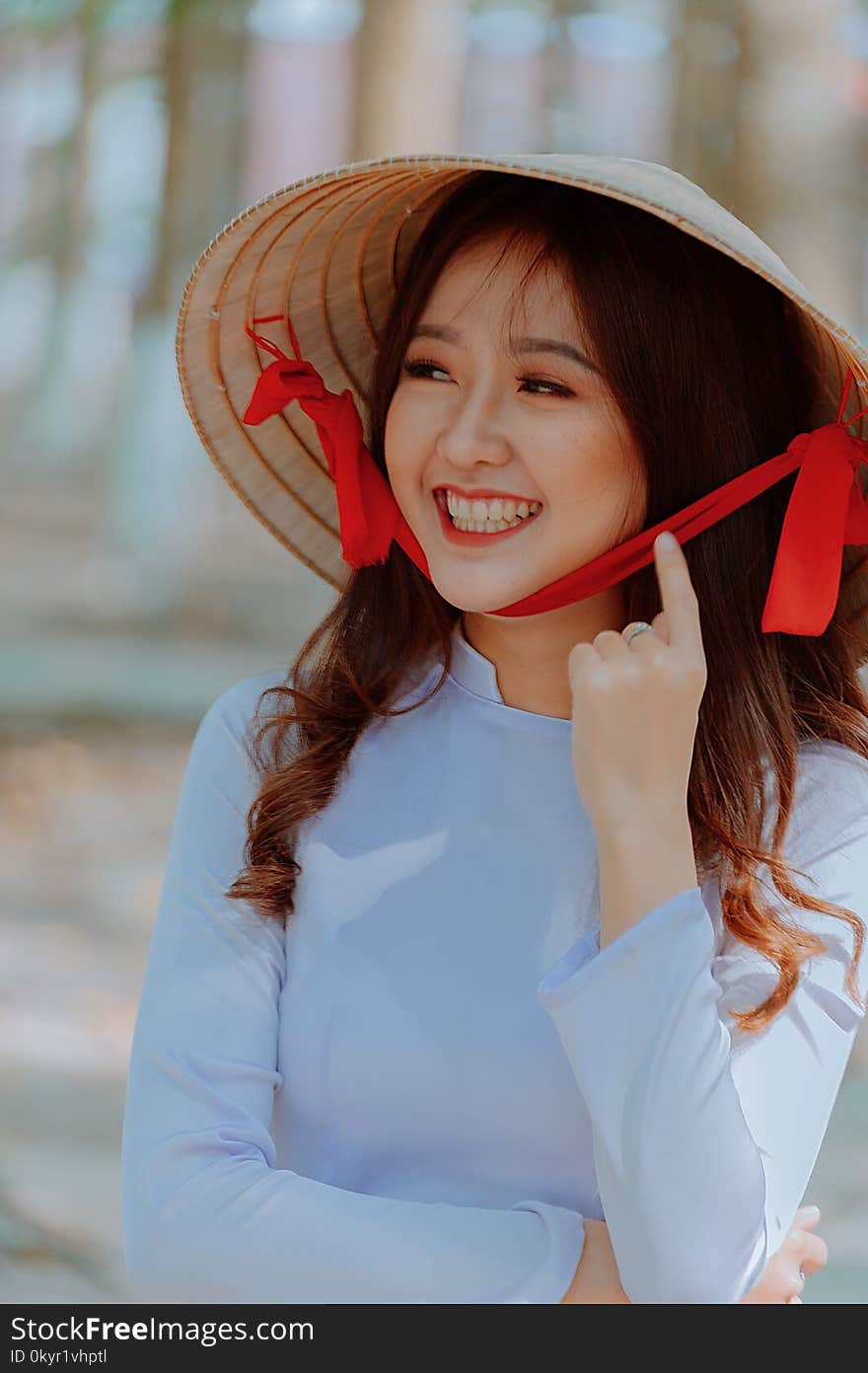 Close-Up Photography of a Woman Wearing Straw Hat