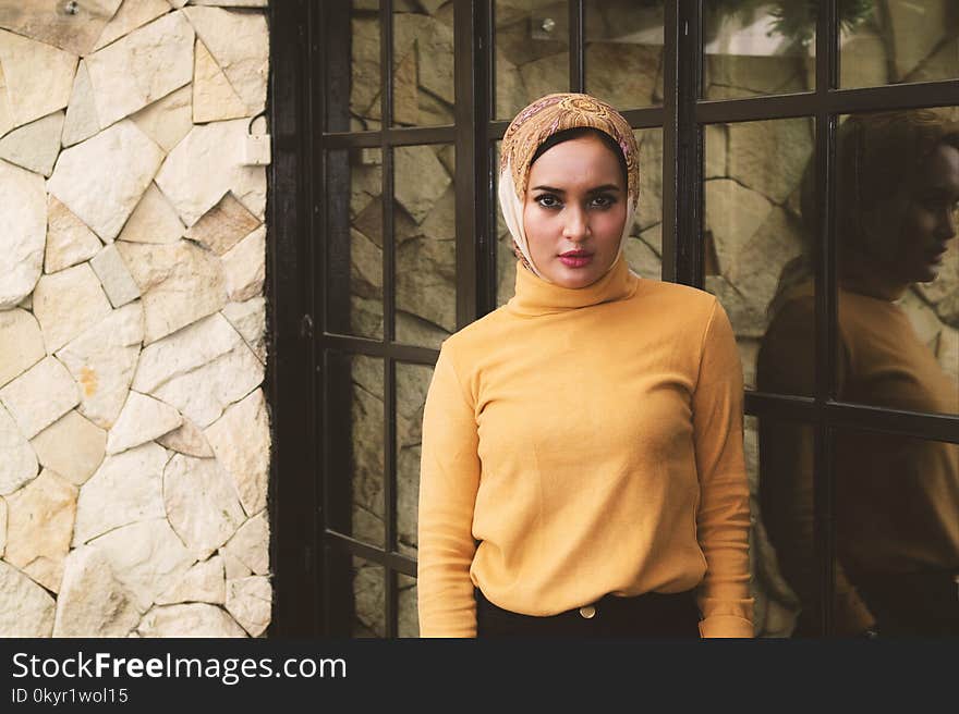 Photo of Woman Wearing Brown Hijab