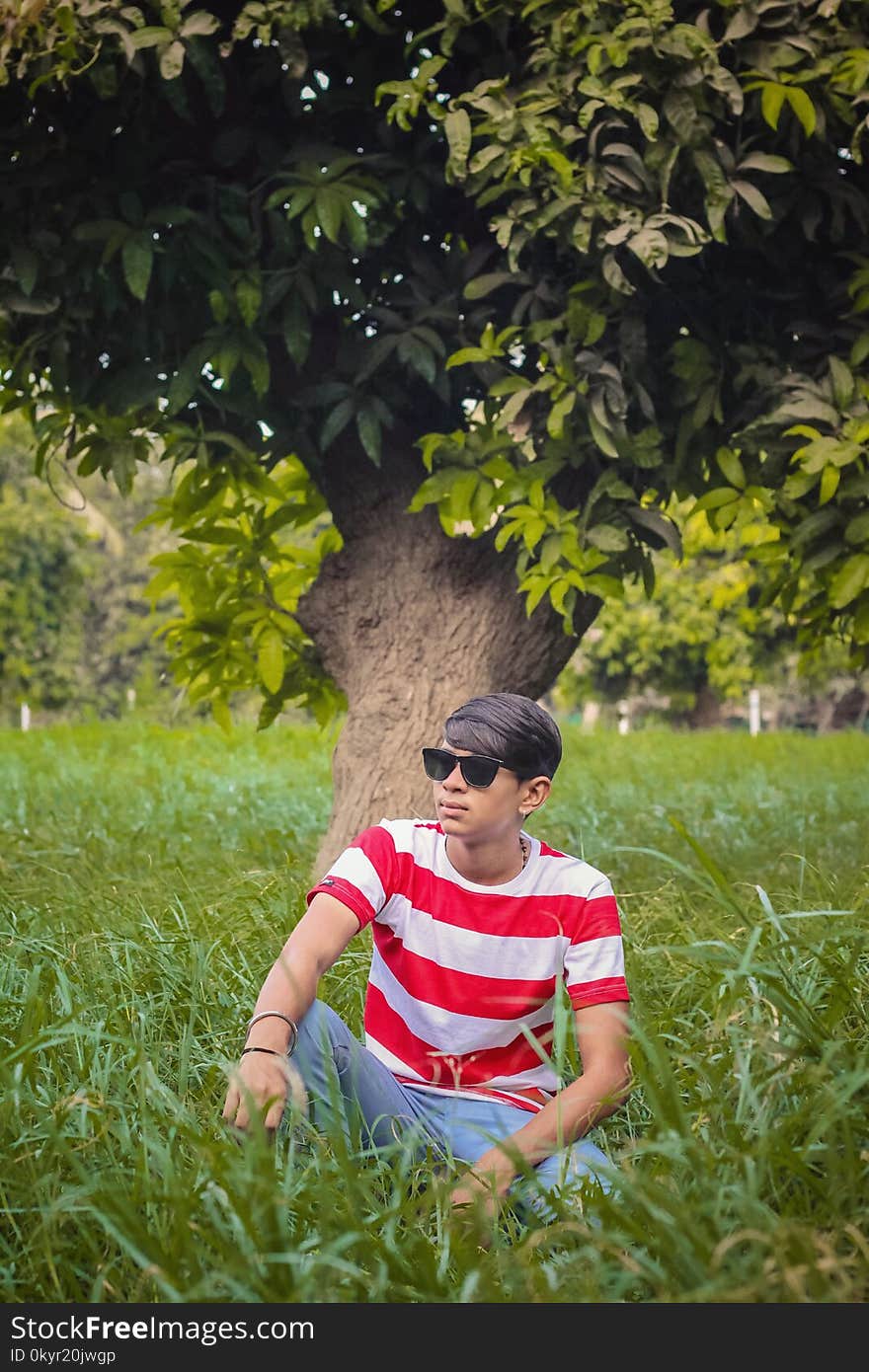 Man Wearing Sunglasses Near Tree