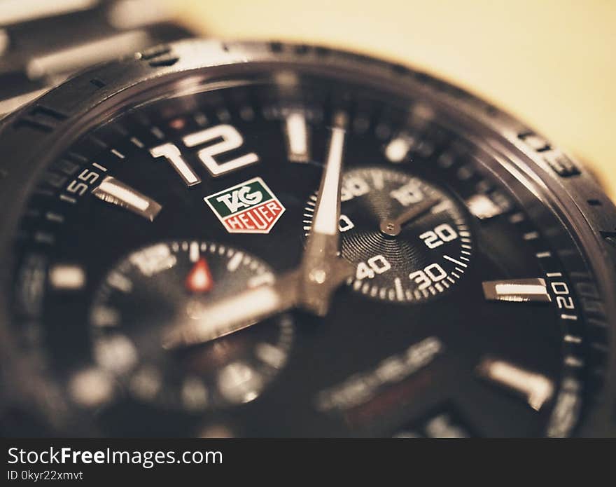 Round Black Tag Heuer Chronograph Watch