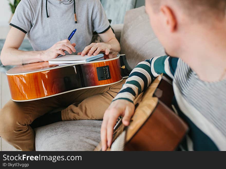 Learning to play the guitar. Music education.