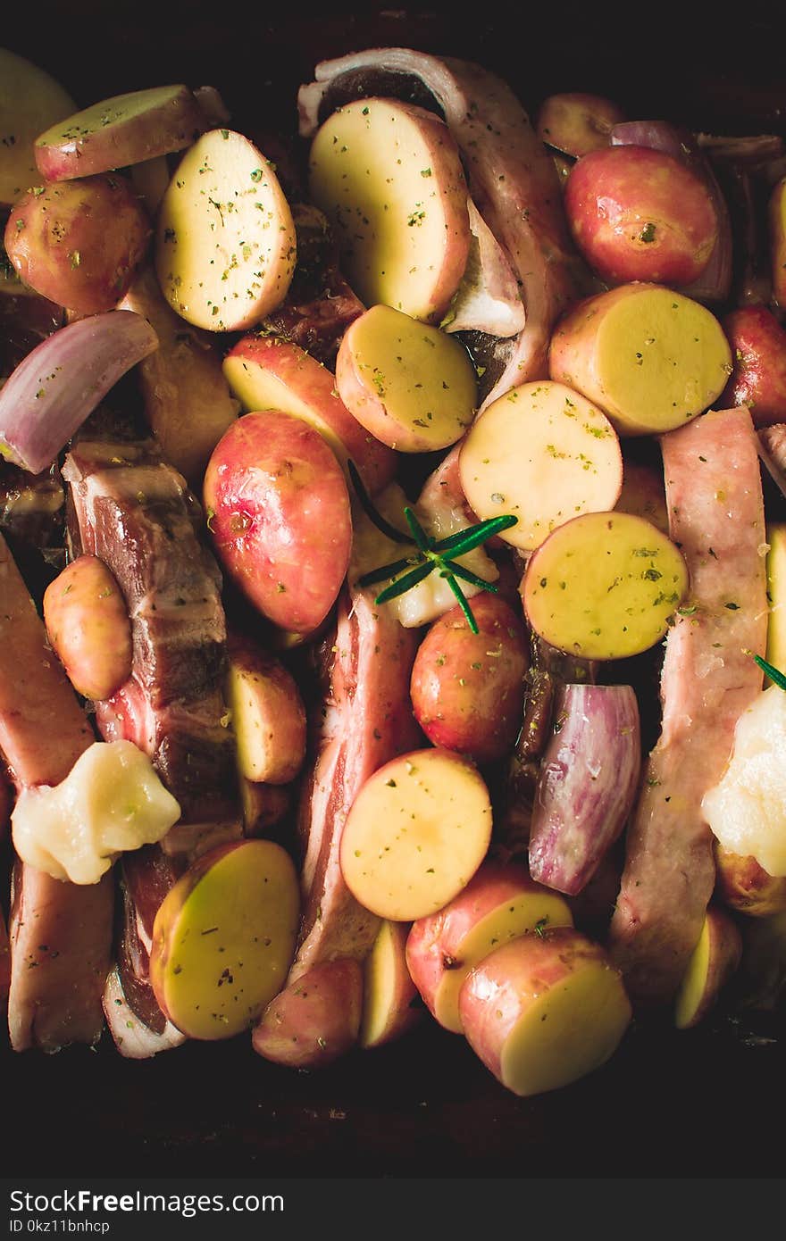 Lamb Loin Chops With Vegetables In Rustic Clay Dish Prepared For Roasting