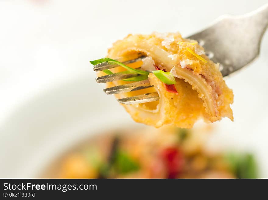 Fried Squids Calamari, Chili Pepper and Mint Leaves on White Plate